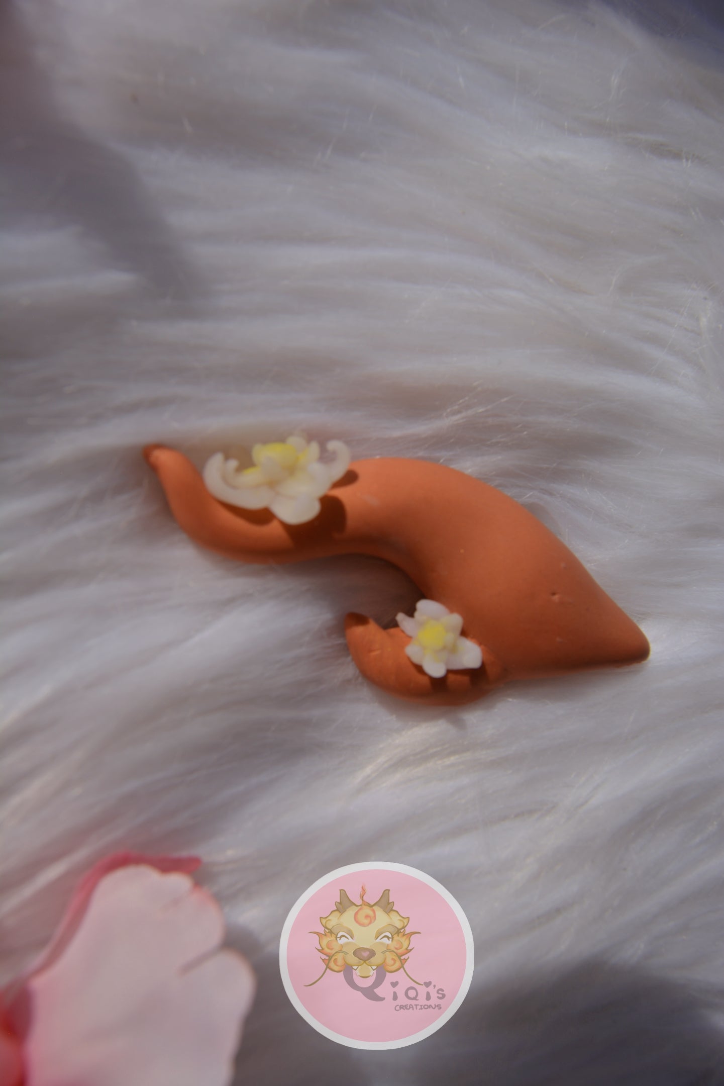 Rose-gold lily Chinese dragon horns